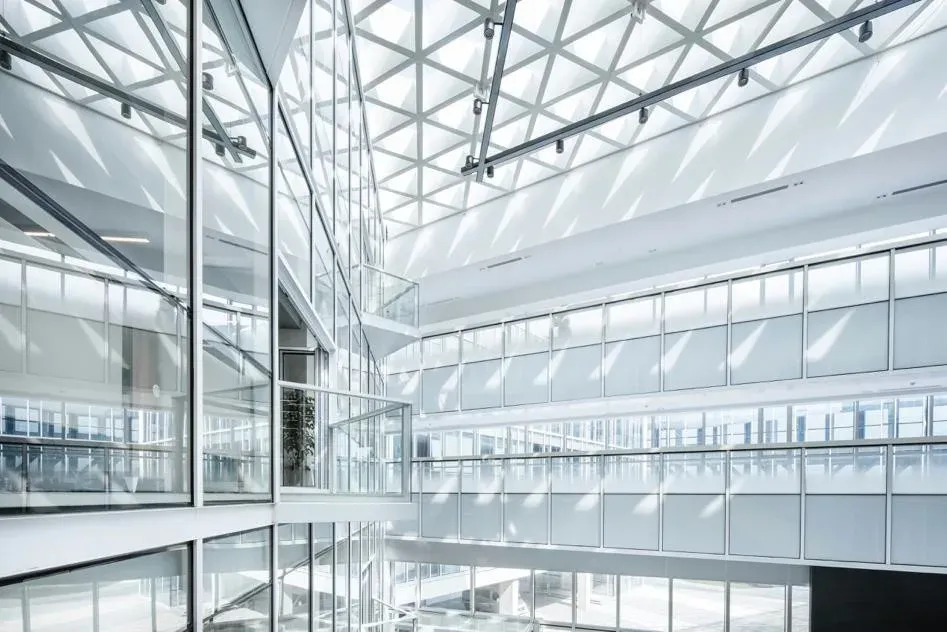 Bright glass office atrium maintained by SoClean