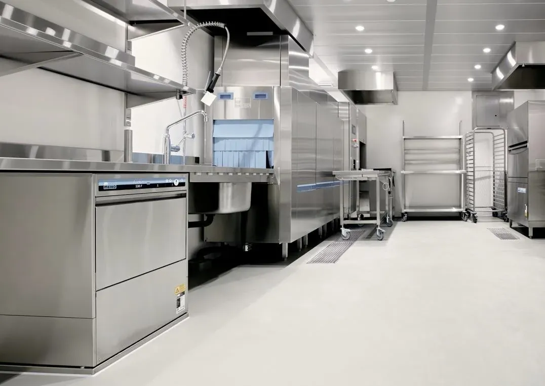 Clean stainless-steel commercial kitchen maintained by SoClean
